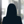 Russell-Cooke Solicitors staff photograph. Silhouette of a female team member against the backdrop of an office window with a soft focus effect.