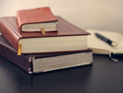 A stack of leather bound books and documentation. New changes to the Family Procedure Rules—Today’s Family Lawyer