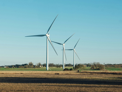 Windmills on a farm in the UK countryside. Court of Appeal clarifies legitimacy of non-objection clauses