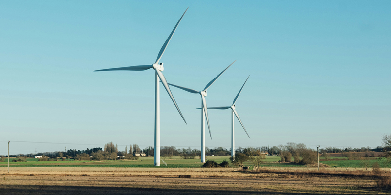 Windmills on a farm in the UK countryside. Court of Appeal clarifies legitimacy of non-objection clauses