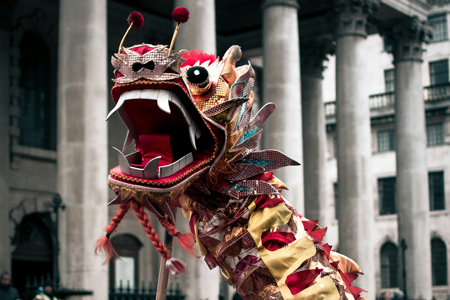 Chinese dragon parade through the streets of London. Embracing the Year of the Dragon
