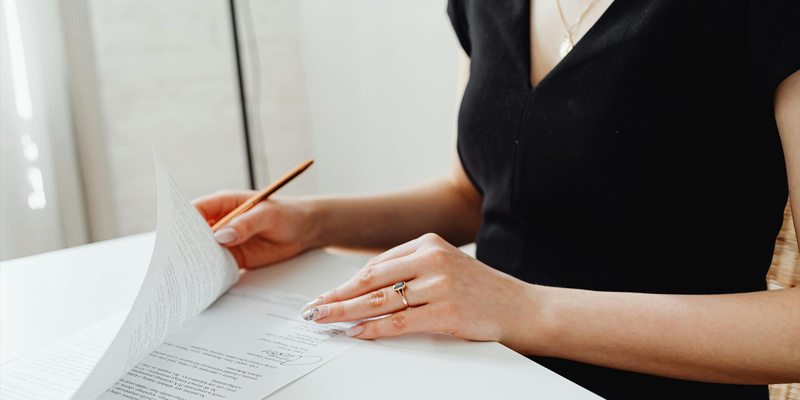 Lady looking through paperwork