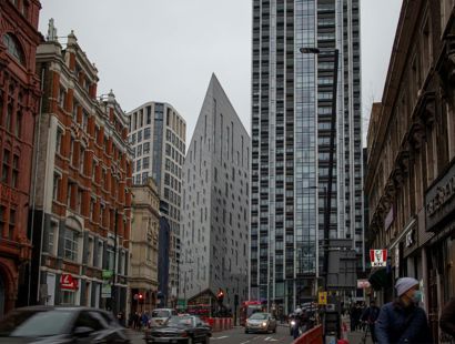 Modern high rise buildings located next to traditional buildings in central London. Building Better—The Law Society Gazette