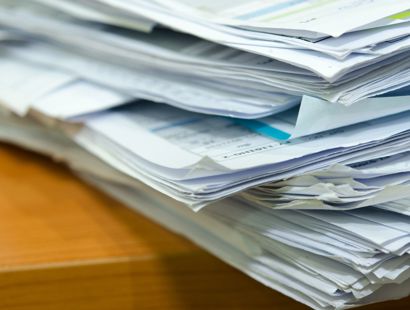 Pile of documents on a desk