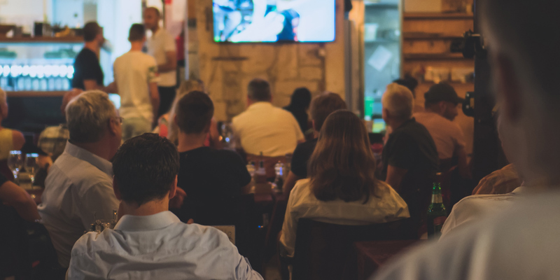 British pub and people watching sports on television. Sky Business in the protection of their branding and Intellectual Property Rights