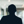 Russell-Cooke Solicitors staff photograph. Silhouette of a male team member against the backdrop of an office with a soft focus effect.