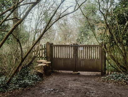 Fence at the end of a path or garden. Am I allowed to claim ownership of a vacant piece of land that I fenced off?—The Times
