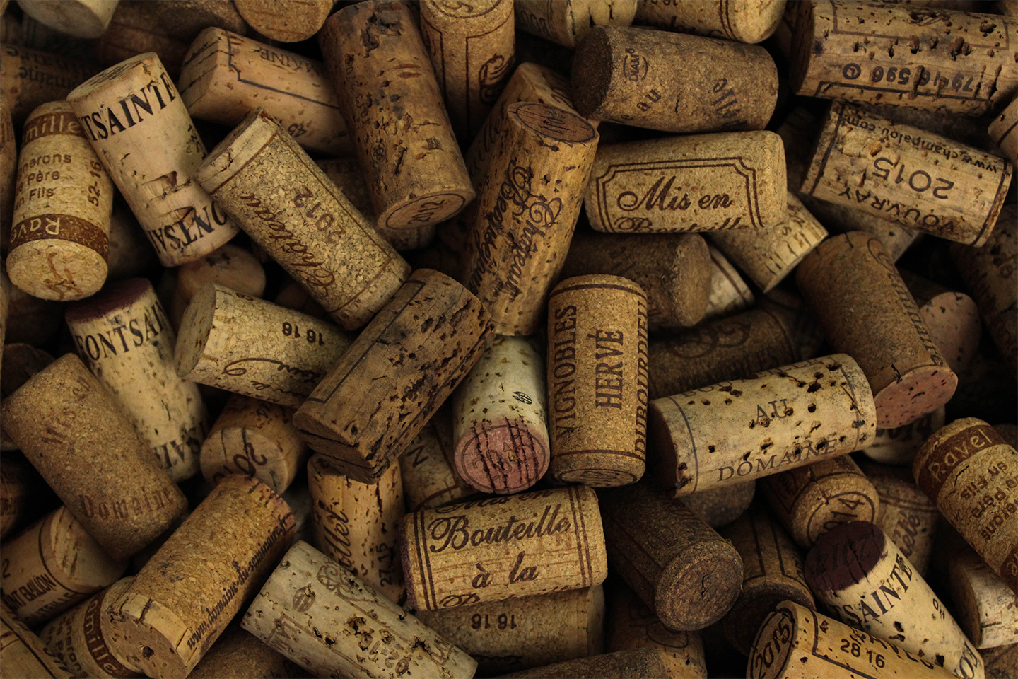 An assortment of wine corks. Russell-Cooke advises Coterie Holdings on acquisition of Hallgarten & Novum Wines