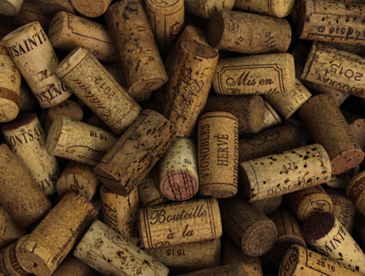 An assortment of wine corks. Russell-Cooke advises Coterie Holdings on acquisition of Hallgarten & Novum Wines