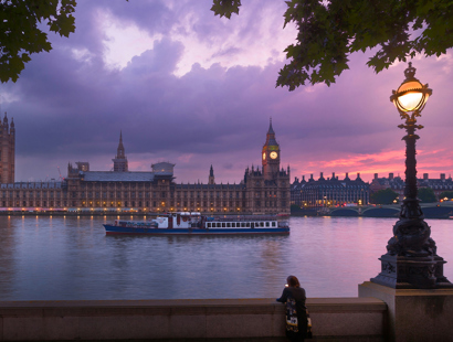 The Houses of Parliament at dusk from across the River Thames. Spring Budget—a closer look at the proposed reforms for non-domiciled UK residents