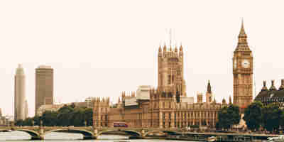 Houses of Parliament across the River Thames. Closing loopholes—impact analysis of the Levelling Up & Regeneration Act 2023