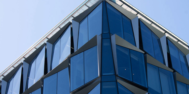 Real Estate Legal News—October 2023: Corporate building with glass windows