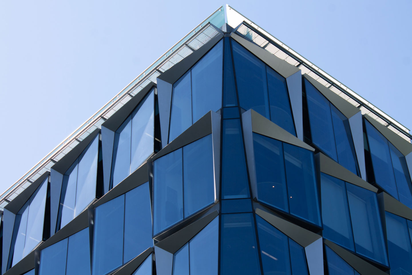Real Estate Legal News—October 2023: Corporate building with glass windows