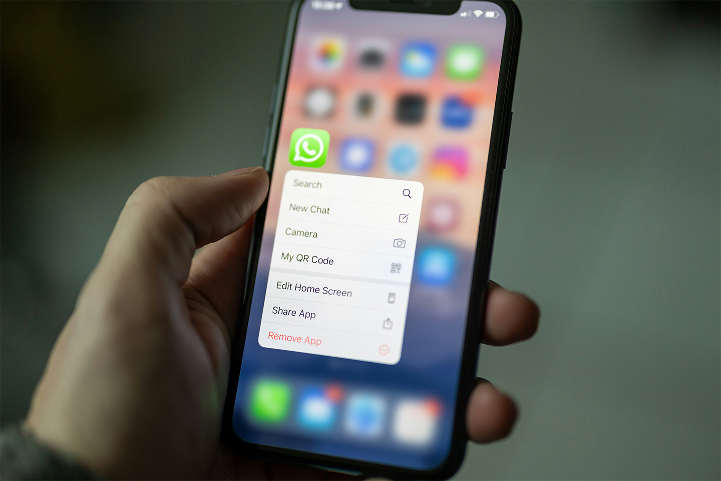 A person holding a phone with whatsapp messages. Lessons from the Post Office and Covid Inquiry—how recent scandals highlight disclosure issues in litigation