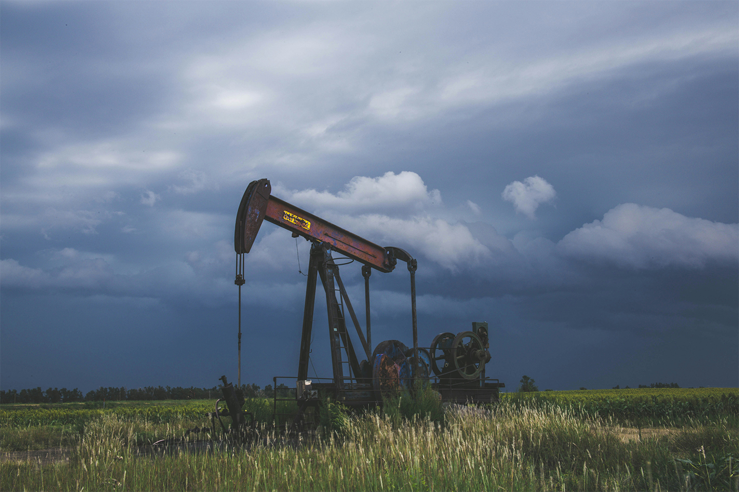An oil field in the British countryside. -Assessing pending Supreme Court verdict in a Surrey oil field case—Property Week