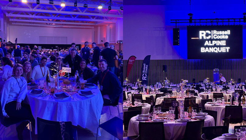 The picture shows a group of people sitting at a dining table and a large event space with lots of tables for a banquet at PropSki 2026