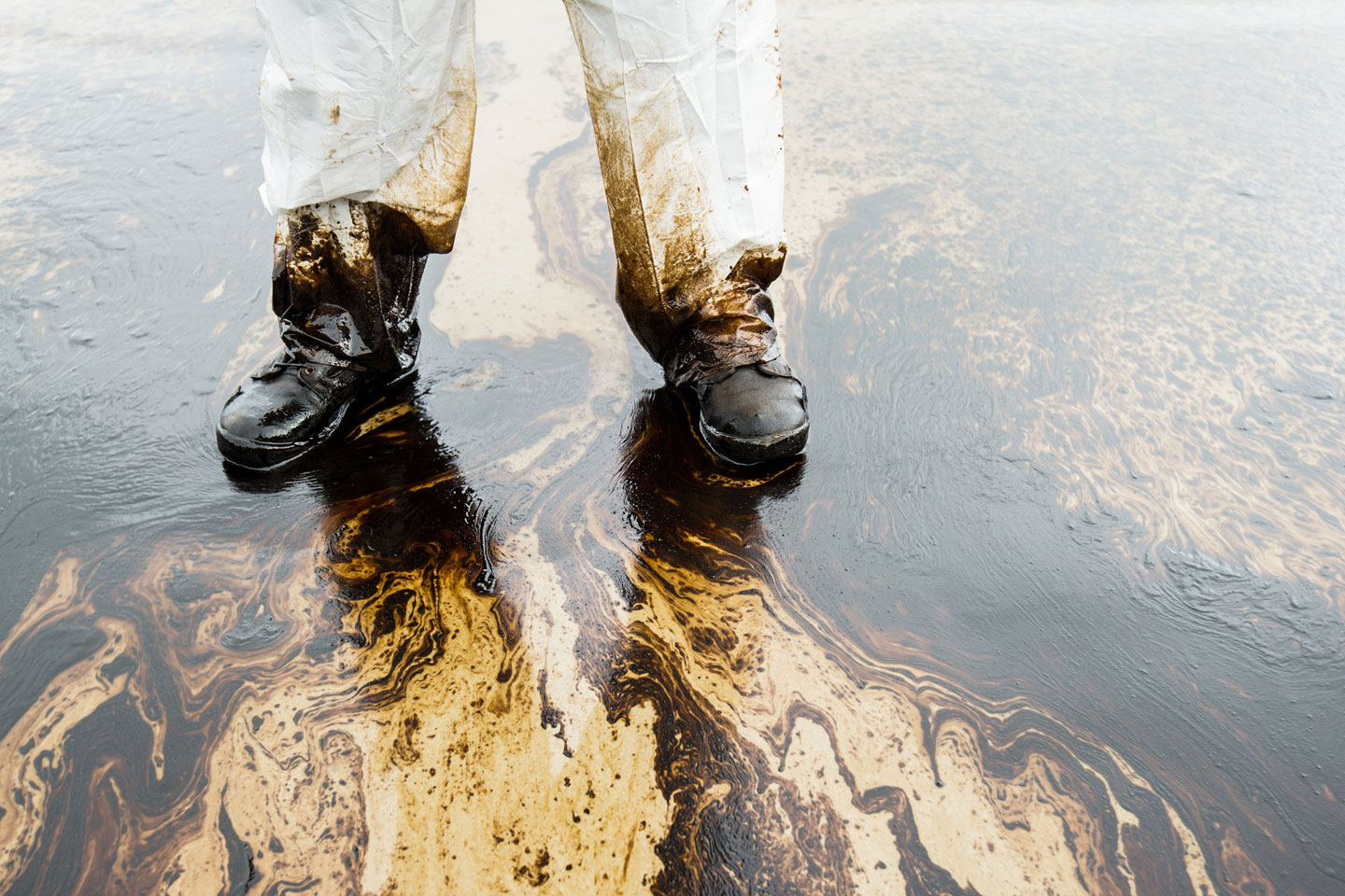 Russell-Cooke real estate disputes. Image of oil spill on land